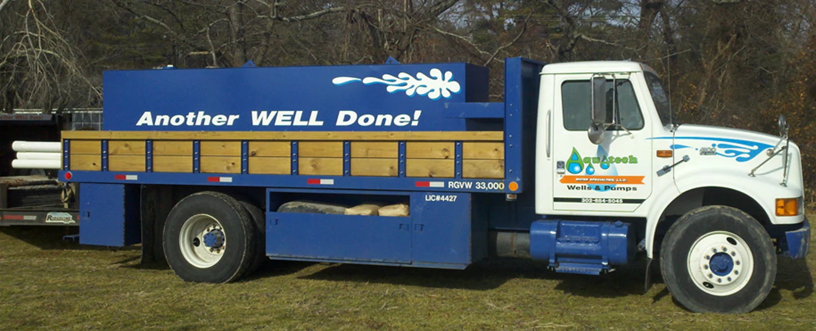 Aquatech branded truck with Another Well Done lettering